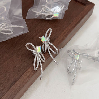 Cubical Bow Delight: Iridescent Butterfly Earrings